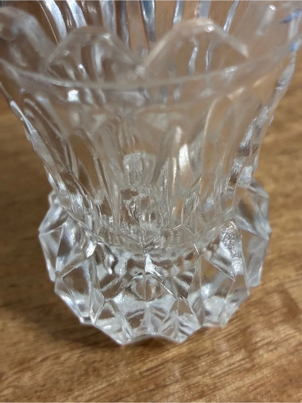 vintage crystal toothpick holder,featuring a sawtooth rim and diamond-cut design